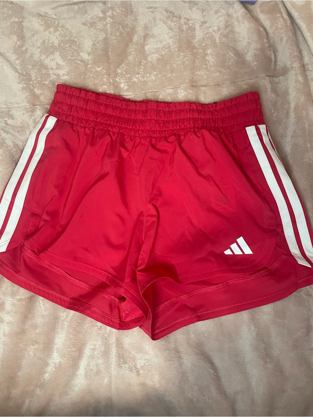 Adidas Women's Pink Athletic Shorts with White Stripes